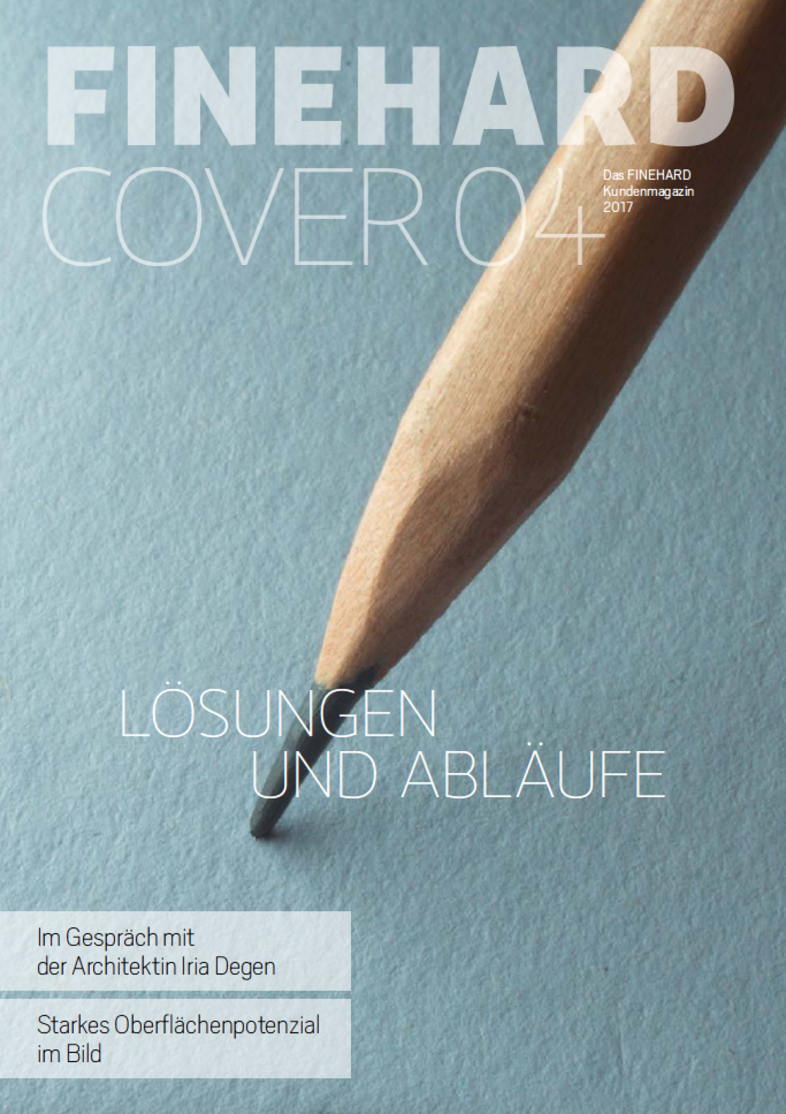 Magazin-Vorschau. FINEHARD Cover Nr. 4: Lösungen und Abläufe. Küchenarbeitsplatte in Basalt-Optik, davor eine Nahaufnahme eines Bleistifts. Eine von vielen FINEHARD Oberflächen.